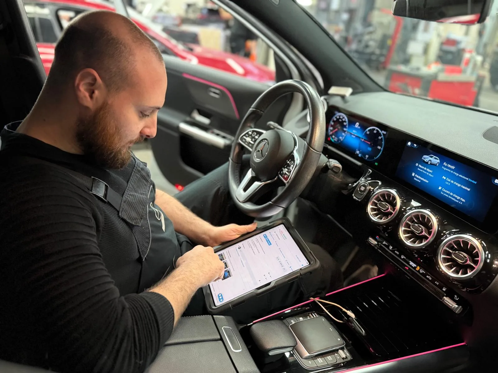 Technician using Autodialog on tablet